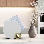 round napkin holder gold and white in kitchen