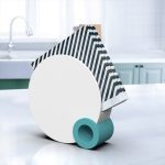 round napkin holder green and white in kitchen